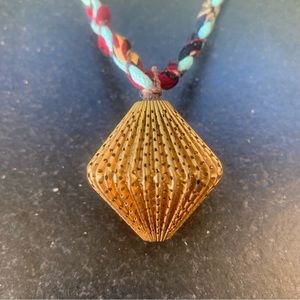 Wearable Art - Mid-century Bronze Orb pendant suspended from Silk Braid